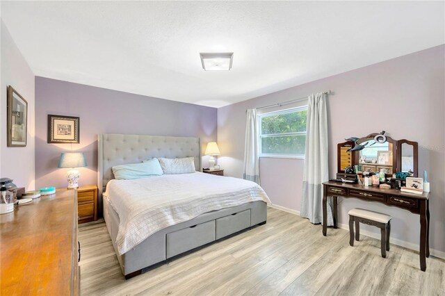 bedroom featuring light hardwood / wood-style flooring