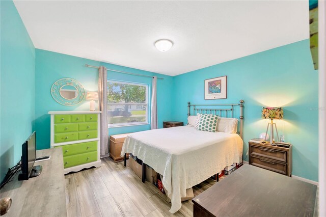 bedroom featuring light wood-type flooring