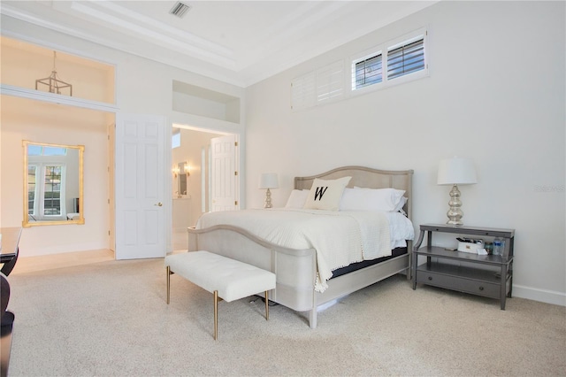 carpeted bedroom featuring visible vents and baseboards