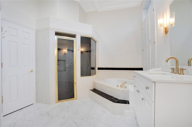 full bathroom featuring vanity, marble finish floor, a garden tub, and a shower stall