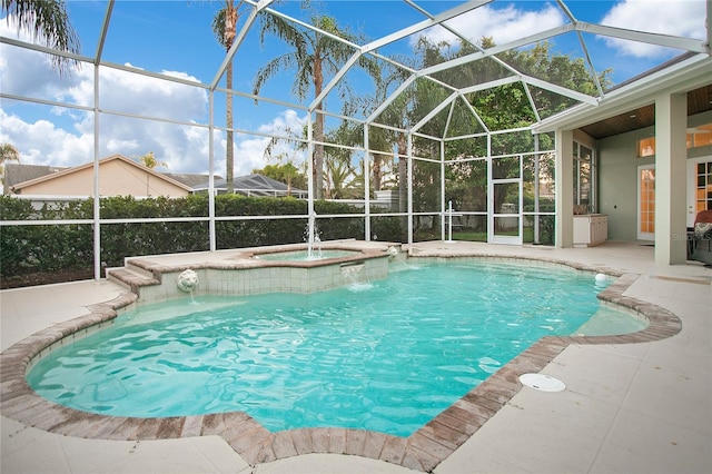 outdoor pool featuring a lanai, a jacuzzi, and a patio