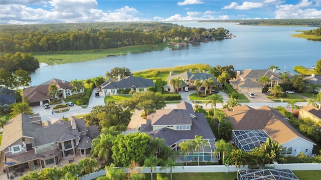 aerial view with a residential view and a water view