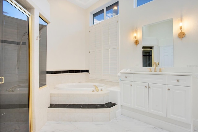 full bath featuring vanity, a shower stall, a bath, and marble finish floor