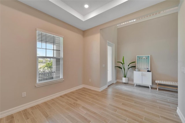 empty room with light hardwood / wood-style floors