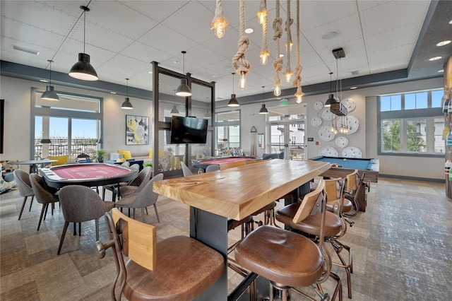 dining space with french doors, plenty of natural light, and billiards