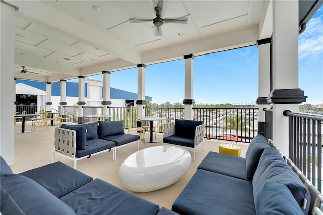 sunroom / solarium with ceiling fan and a wealth of natural light