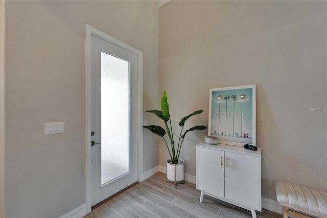 foyer entrance featuring light hardwood / wood-style flooring and plenty of natural light