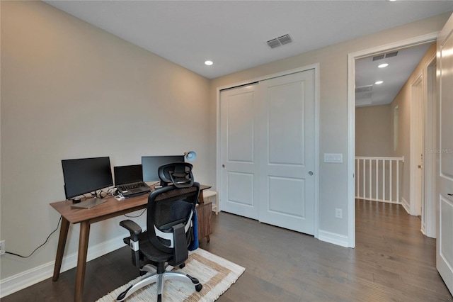 office space with hardwood / wood-style floors