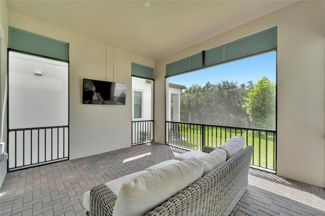 sunroom / solarium featuring a wealth of natural light