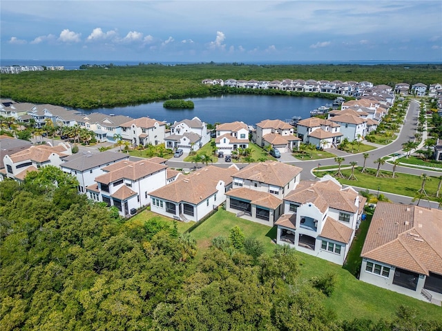 bird's eye view with a water view