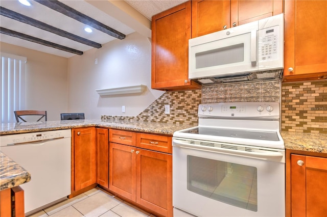 kitchen featuring white appliances, tasteful backsplash, beamed ceiling, light tile patterned flooring, and light stone counters