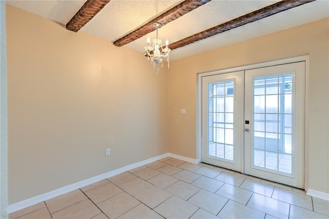 doorway featuring french doors, light tile patterned floors, a textured ceiling, beamed ceiling, and a notable chandelier