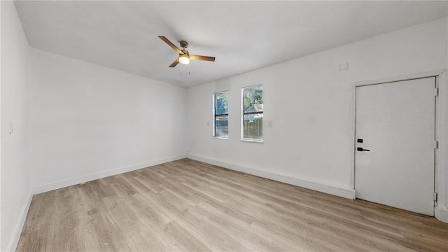 unfurnished room with ceiling fan and light hardwood / wood-style floors