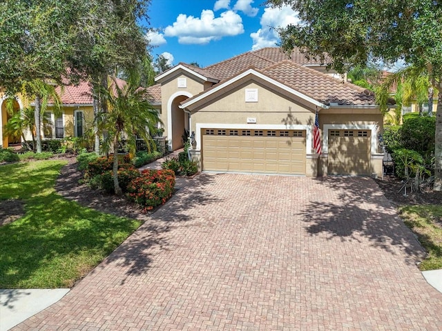 view of front of property featuring a garage