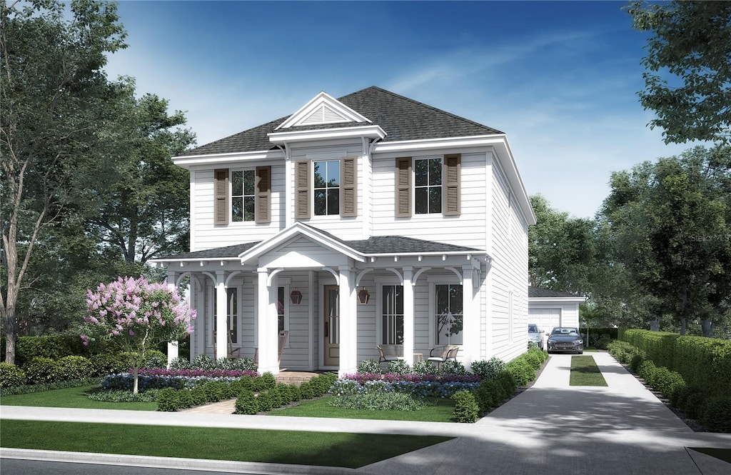 view of front of property with a front yard and covered porch