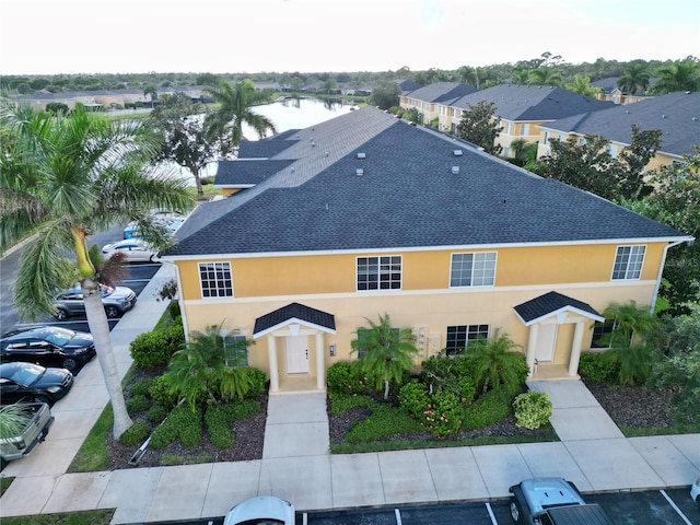 exterior space with a water view