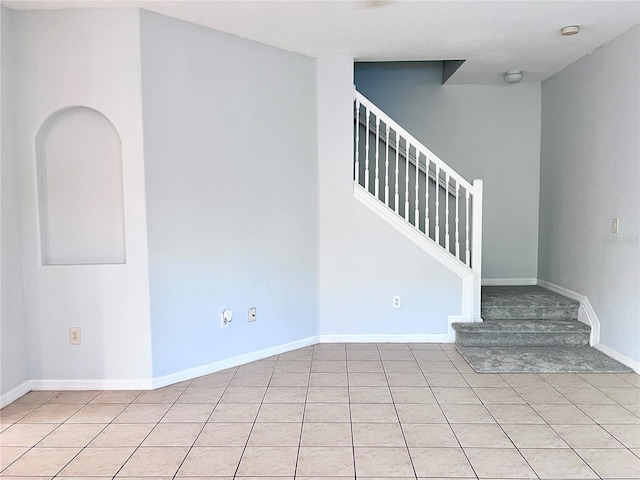 interior space featuring light tile patterned flooring