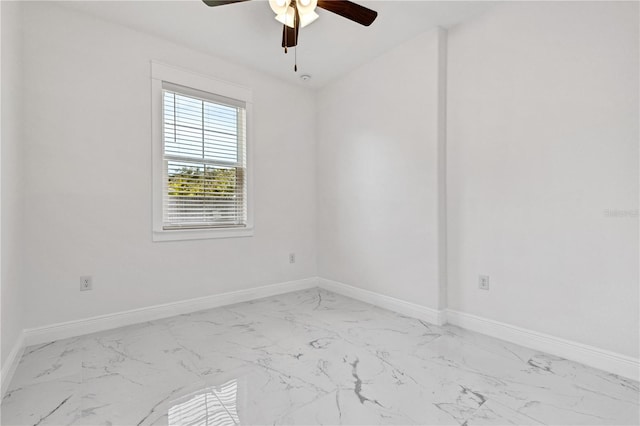 spare room featuring ceiling fan