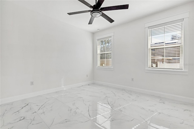 unfurnished room with ceiling fan