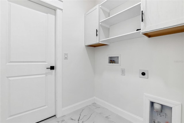 laundry area featuring washer hookup, cabinets, and electric dryer hookup