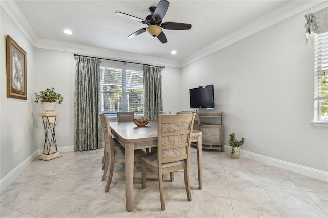 dining space featuring ornamental molding, ceiling fan, and plenty of natural light