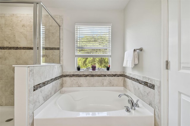 bathroom featuring plus walk in shower