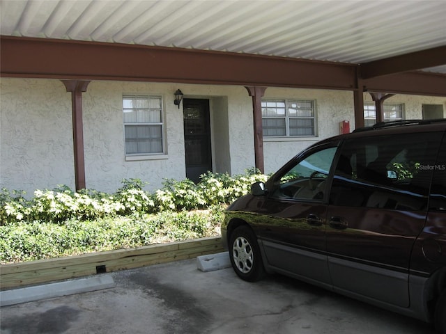 garage with a carport