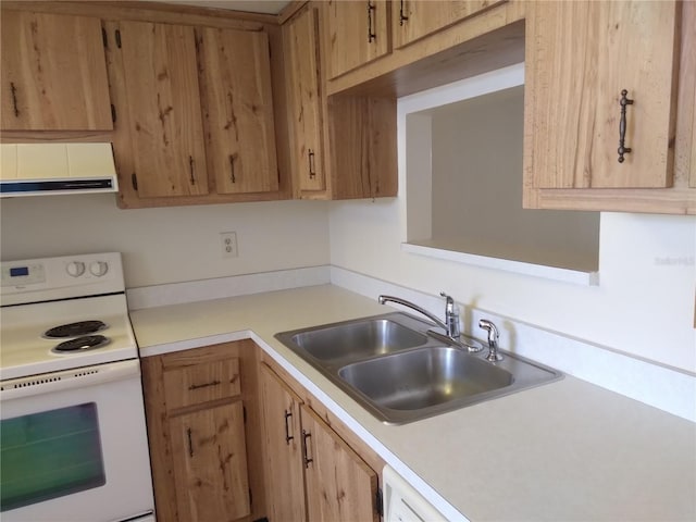 kitchen with extractor fan, electric range, and sink