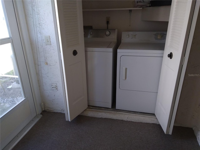 washroom featuring washing machine and dryer