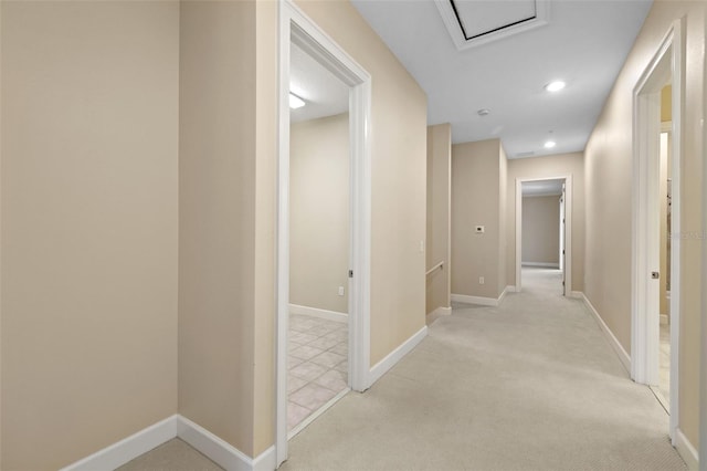 hallway with light carpet