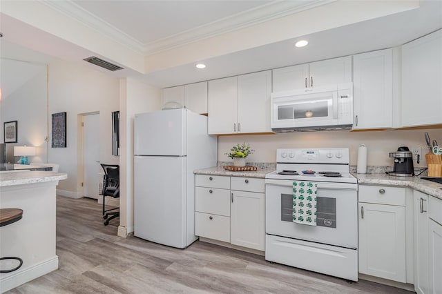 kitchen featuring white cabinetry, white appliances, light stone countertops, light wood-type flooring, and ornamental molding