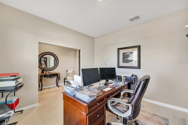 home office featuring light tile patterned floors