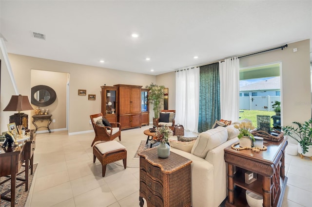 living room featuring light tile patterned flooring