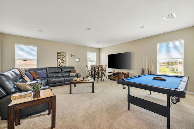 rec room with light carpet, pool table, and plenty of natural light