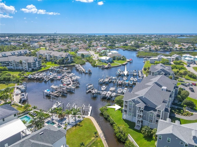 birds eye view of property featuring a water view