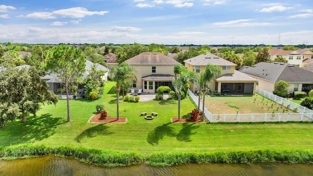 birds eye view of property featuring a water view