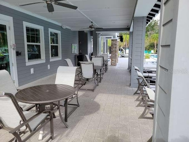 view of patio with ceiling fan