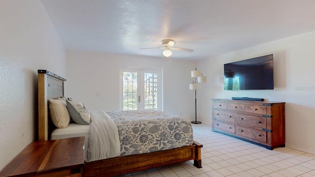 tiled bedroom with access to outside, ceiling fan, and french doors