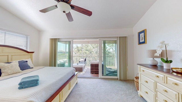 bedroom featuring ceiling fan, vaulted ceiling, light colored carpet, and access to exterior