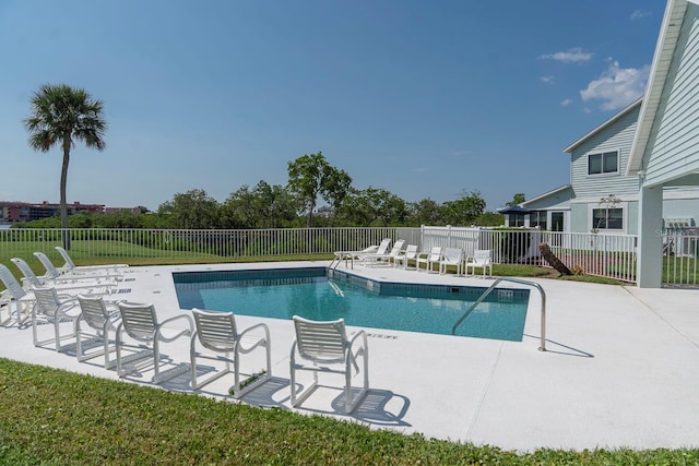 view of pool featuring a patio