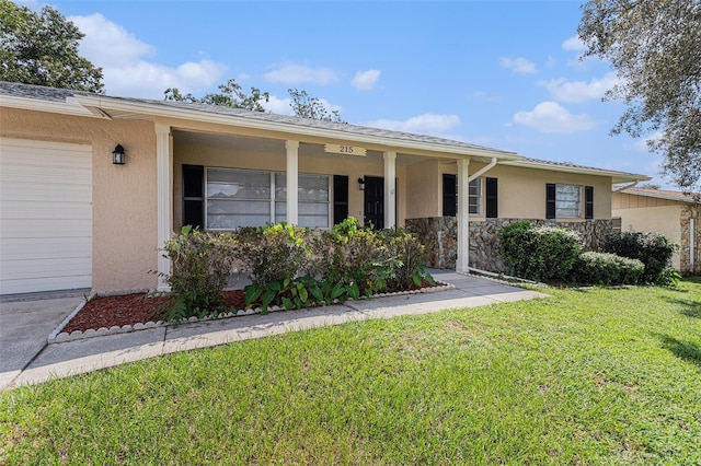 ranch-style home featuring a front yard