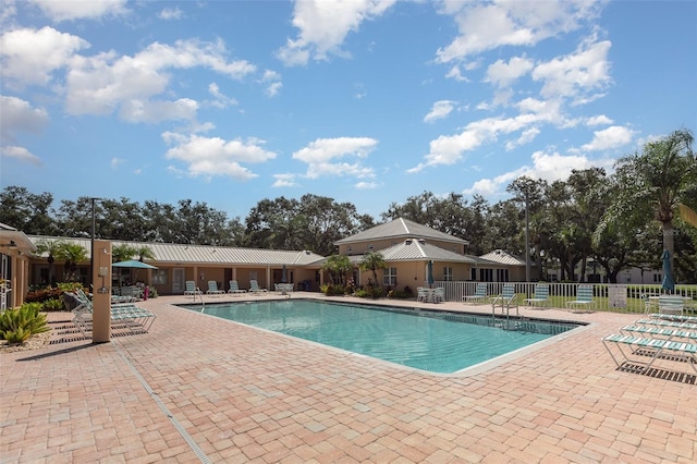 view of pool with a patio