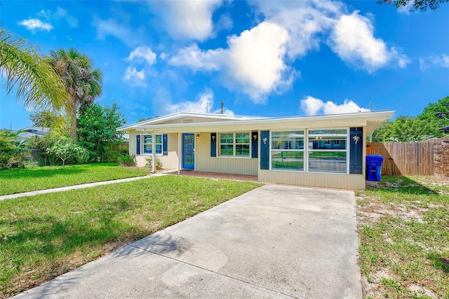 single story home with a front yard