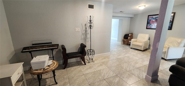 interior space with light tile patterned floors