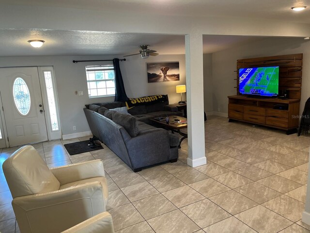 tiled living room with a textured ceiling