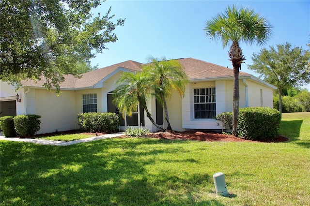 single story home with a front yard