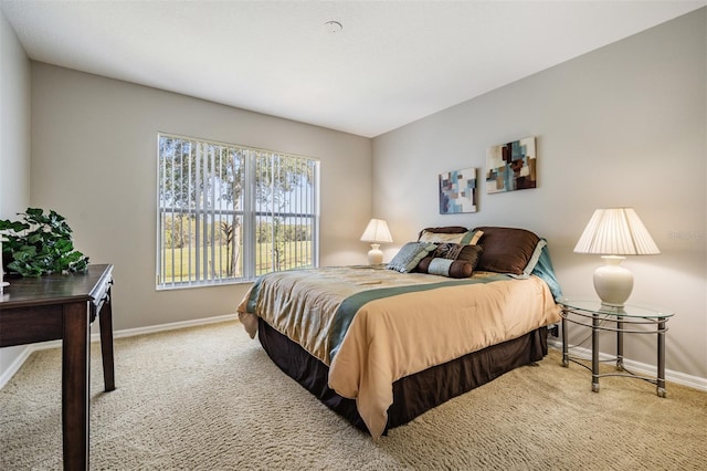 bedroom with light carpet