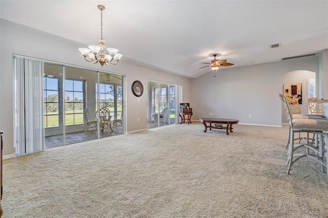 interior space featuring ceiling fan with notable chandelier