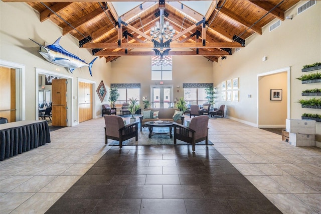 tiled living room featuring french doors, wood ceiling, and high vaulted ceiling