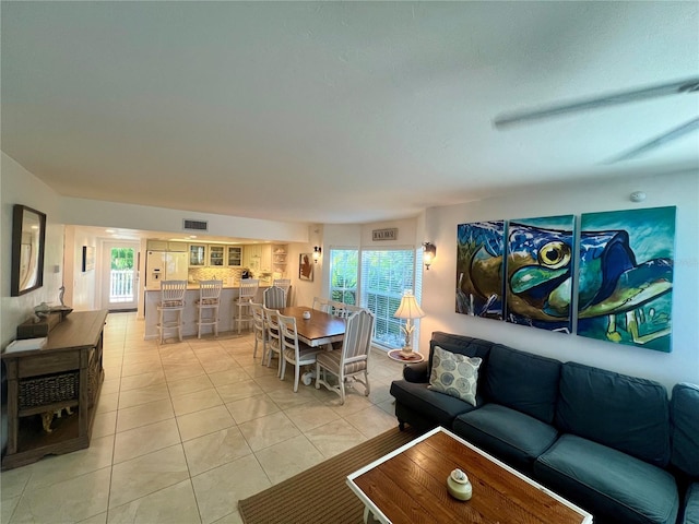 living room with light tile patterned floors